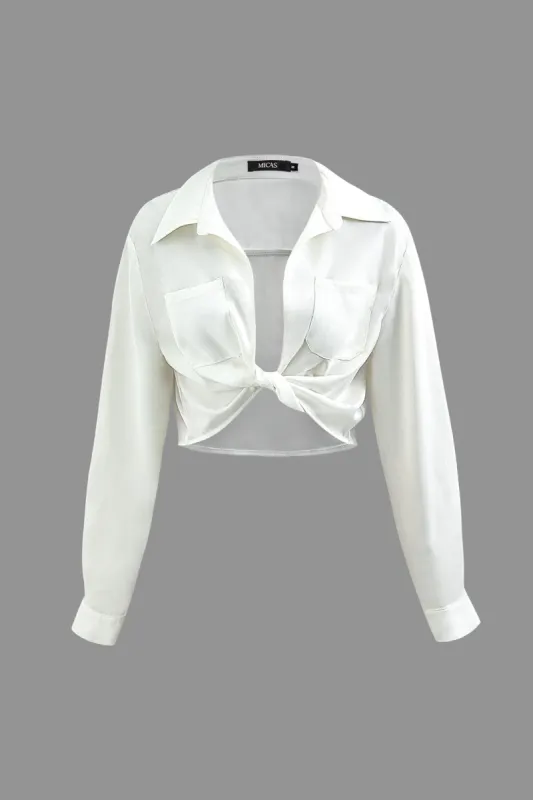 V-neck Twist Hem Chest Pocket Blouse sold by Micas