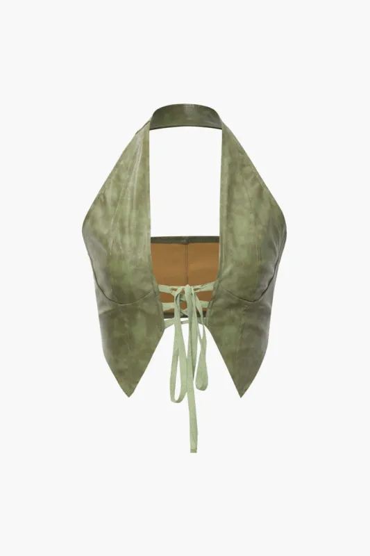 Faux Leather Tie Front Halter Top sold by Micas