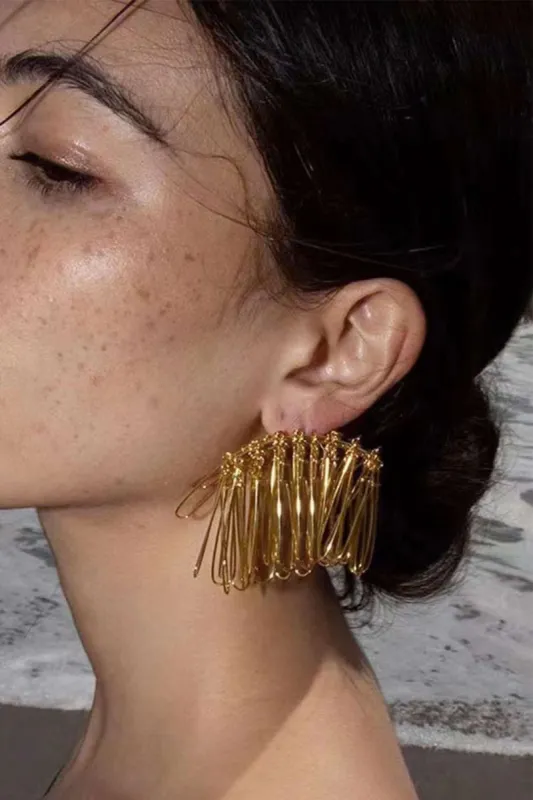 U-pin Earrings sold by Micas