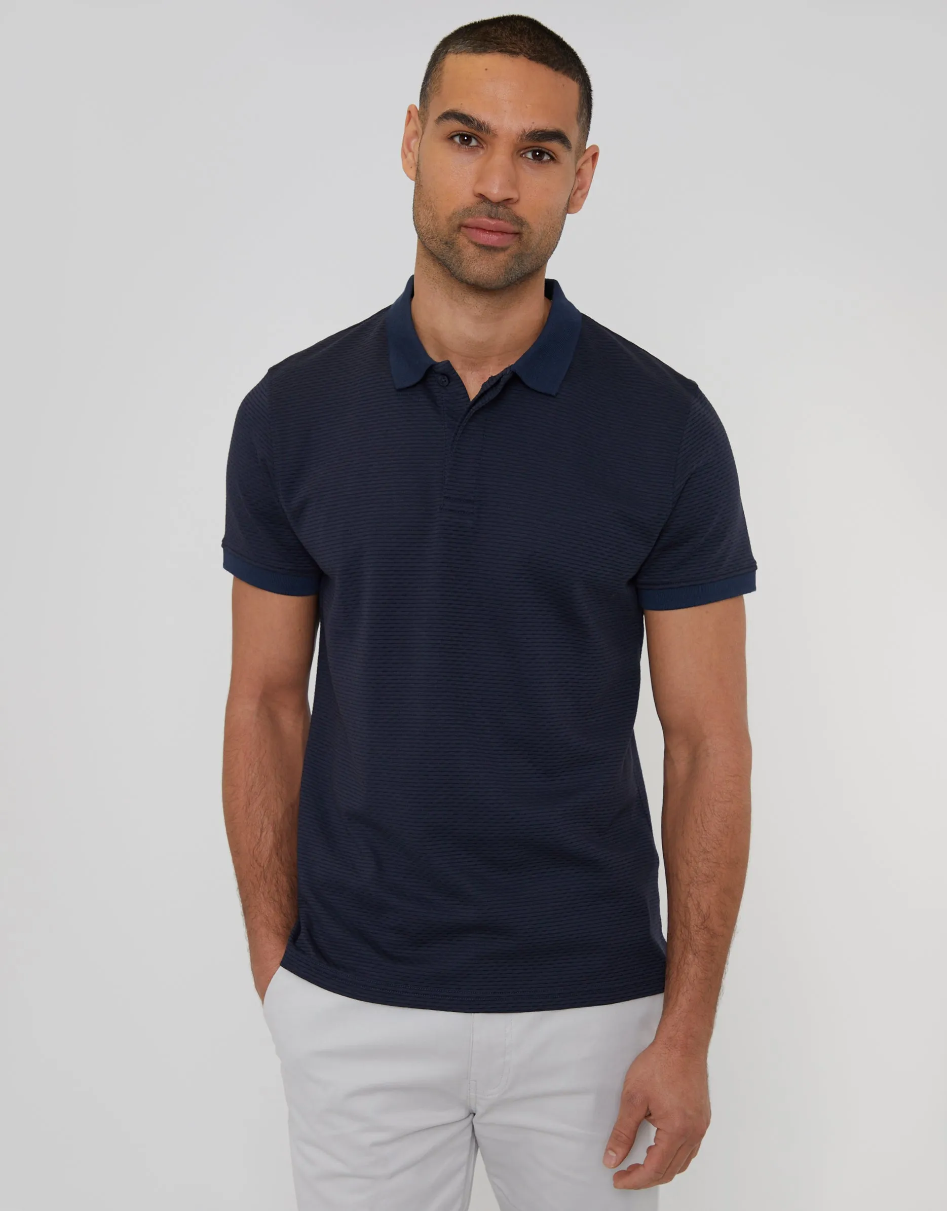 Textured Hidden Placket Polo Shirt in Navy sold by Threadbare
