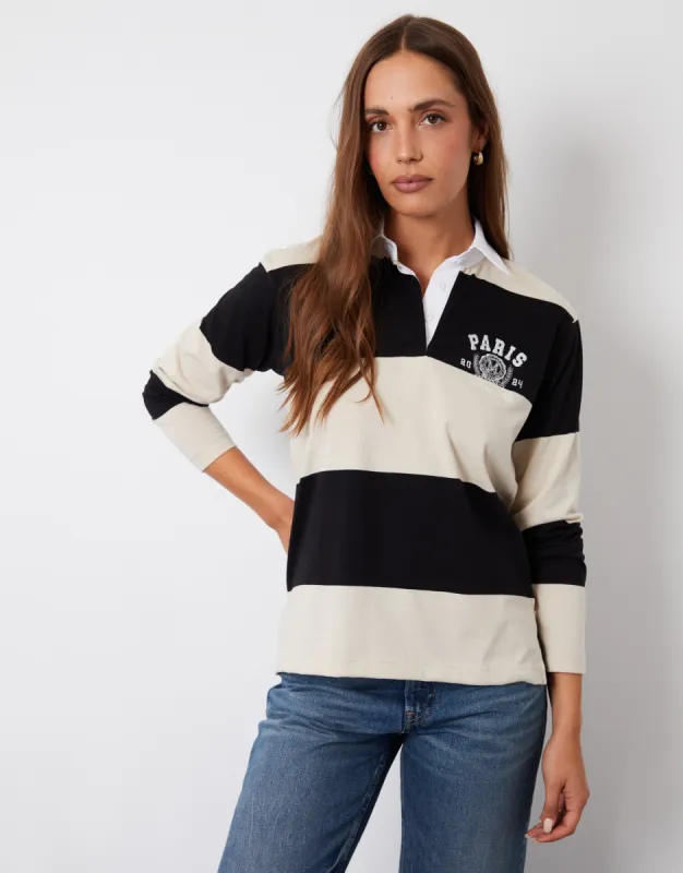 Women's Black & Cream Stripe Paris Embroidery Rugby Shirt sold by Threadbare