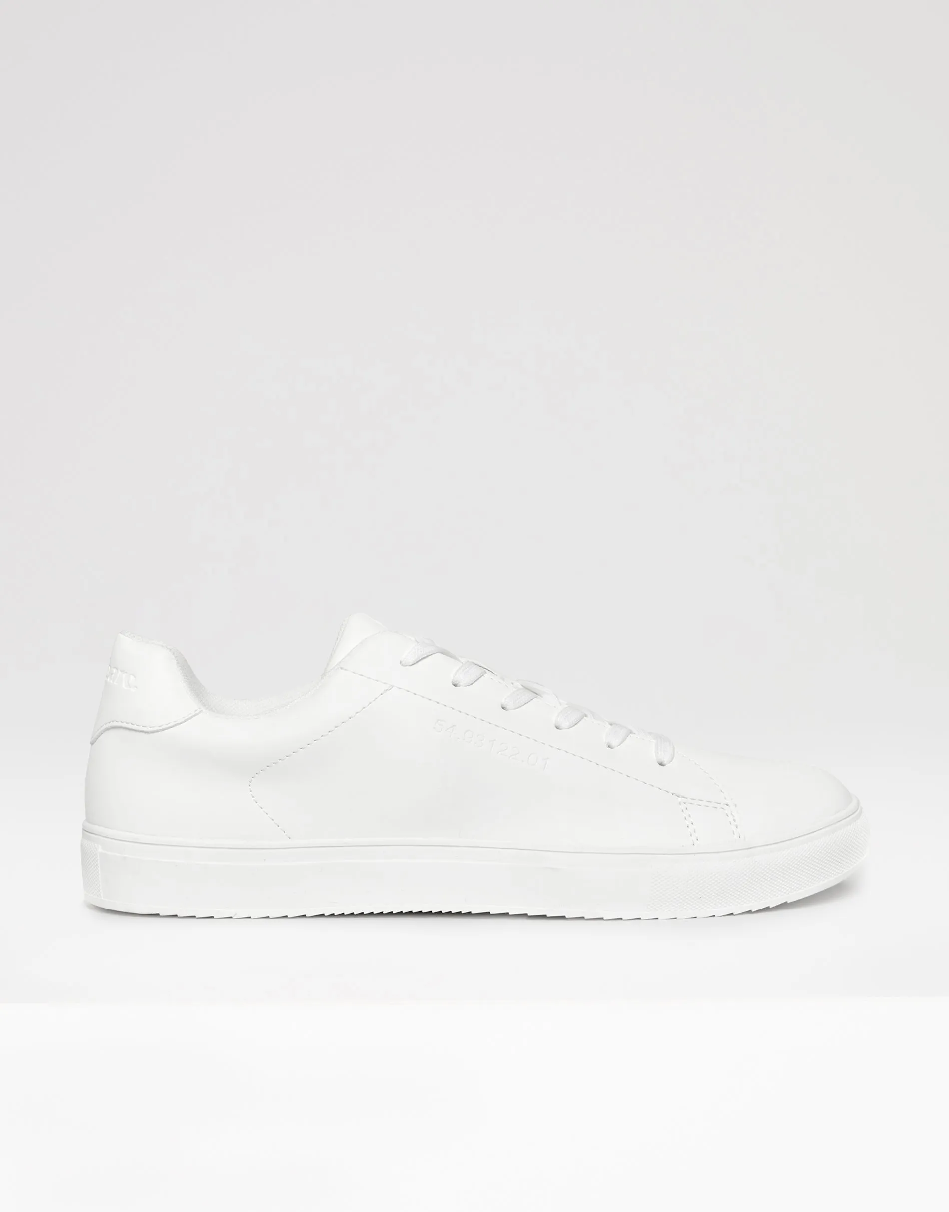 White PU Court Trainers sold by Threadbare