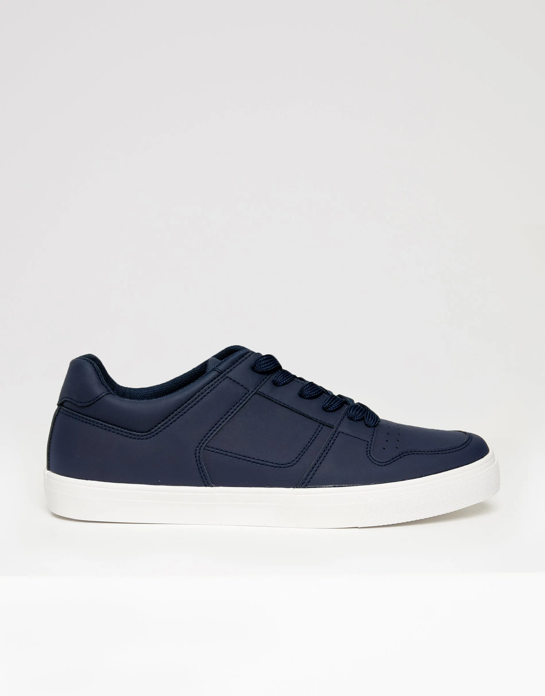 Navy Court Trainers sold by Threadbare