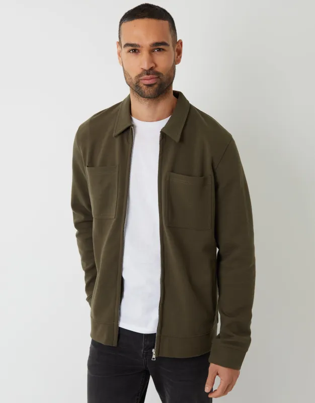 Khaki Green Pique Zip Through Shacket sold by Threadbare