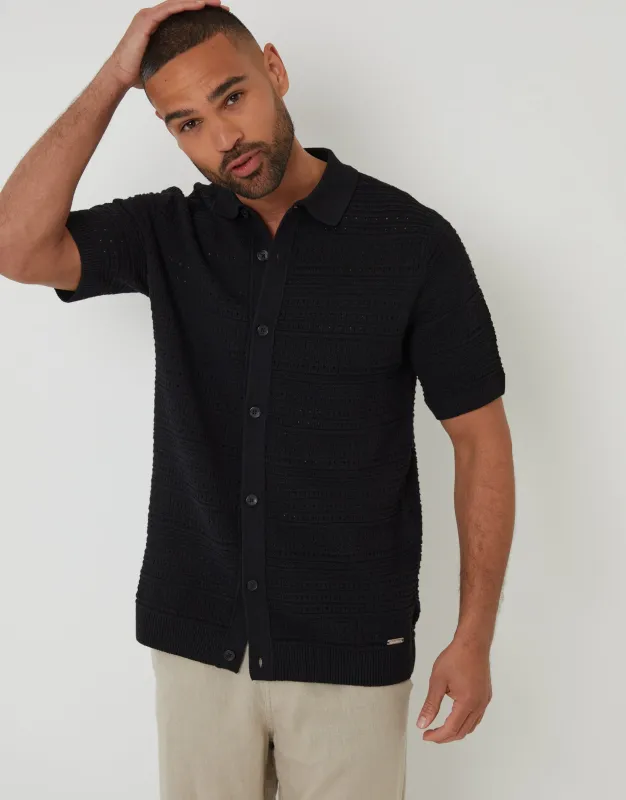 Black Textured Knitted Button Through Polo Shirt sold by Threadbare