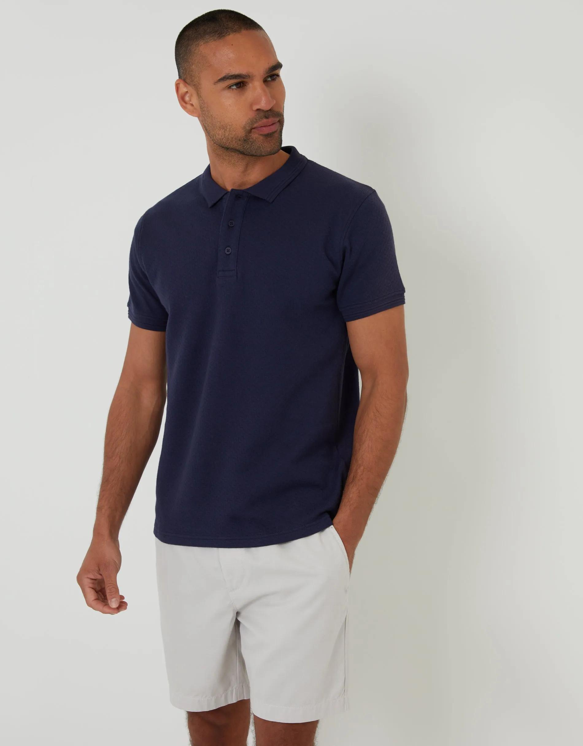 Navy Textured Short Sleeve Polo Shirt sold by Threadbare