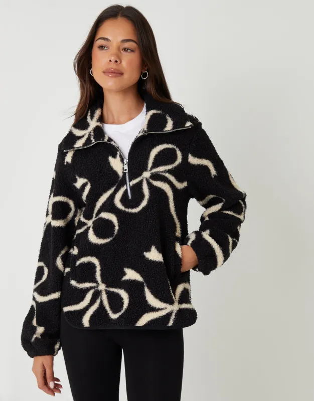 Black Bow Print Quarter Zip Fleece sold by Threadbare