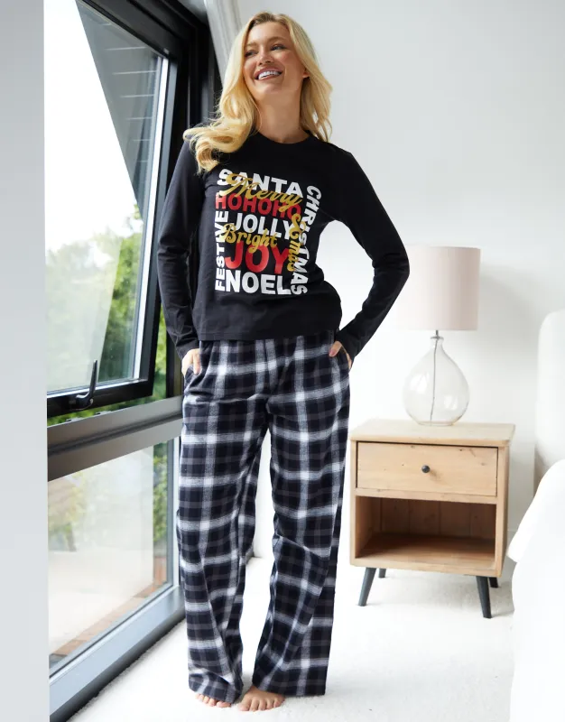 Black Christmas Slogan Graphic Long Pyjamas (2-Piece Set) sold by Threadbare