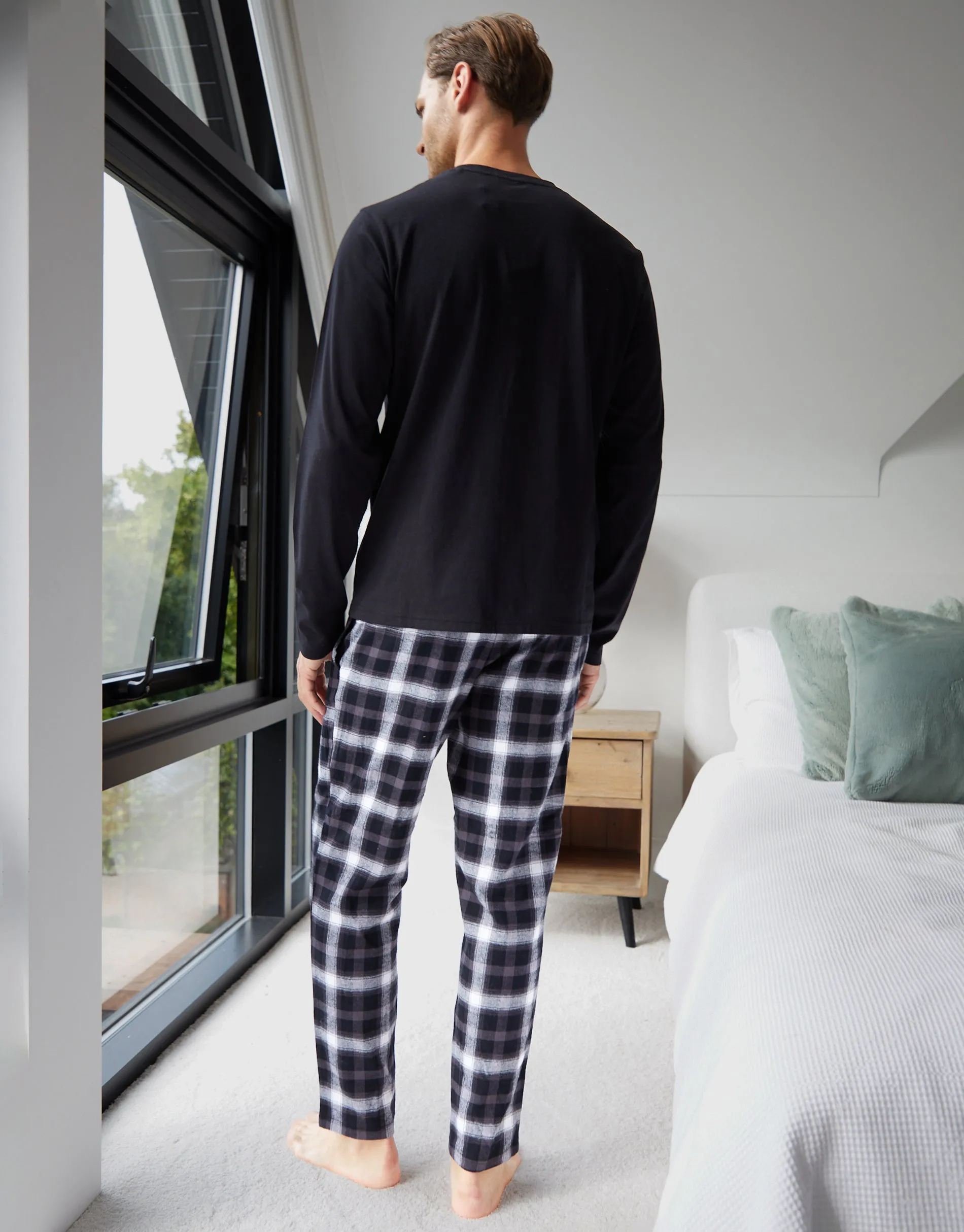 Black Christmas Slogan Graphic Long Pyjamas (2-Piece Set) sold by Threadbare product image thumbnail 3