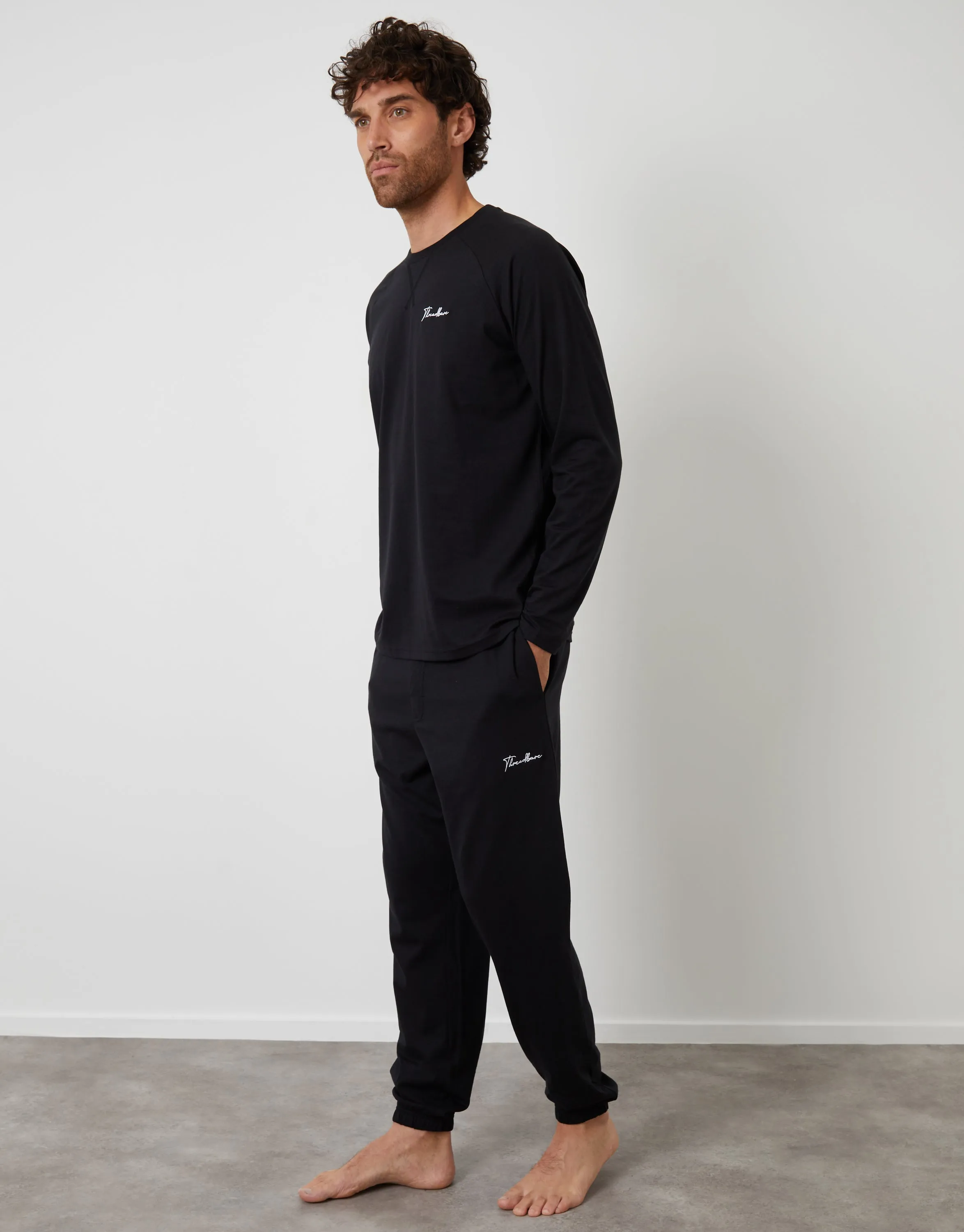 Black Sweatshirt & Jogger Lounge Set (2-Piece Set) sold by Threadbare