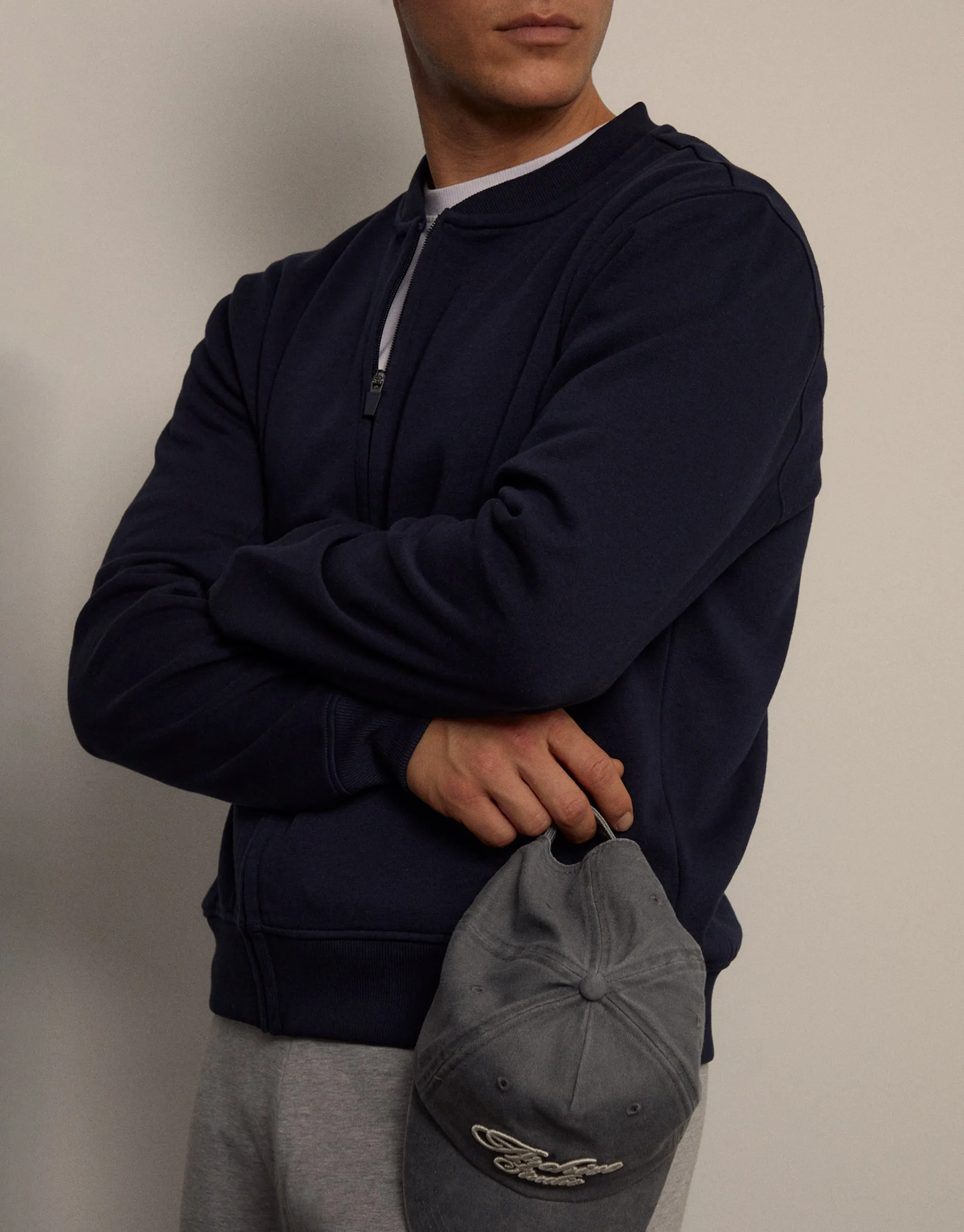 Navy Zip Through Sweat Bomber sold by Threadbare