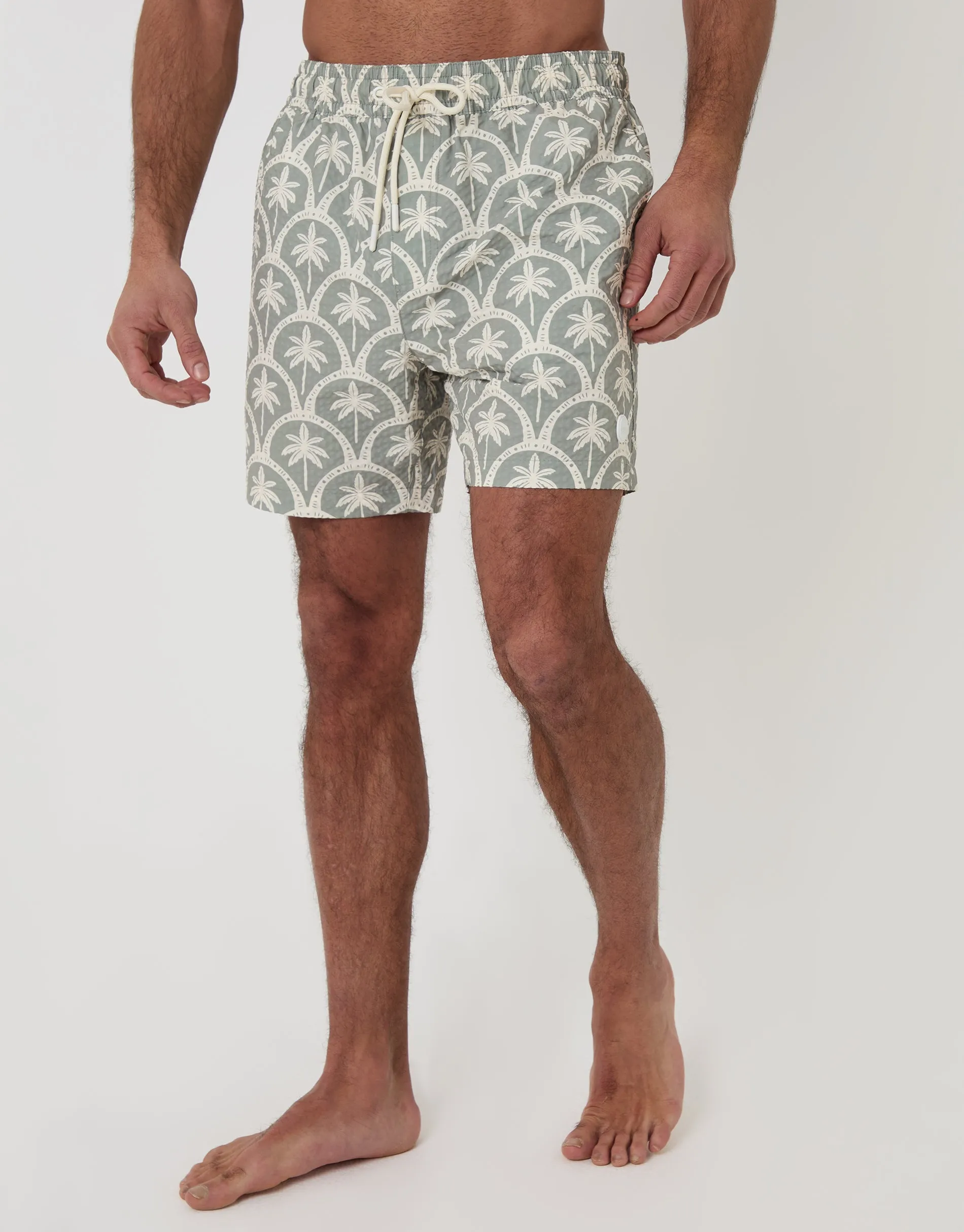 Sage Green Palm Print Seersucker Swim Shorts sold by Threadbare
