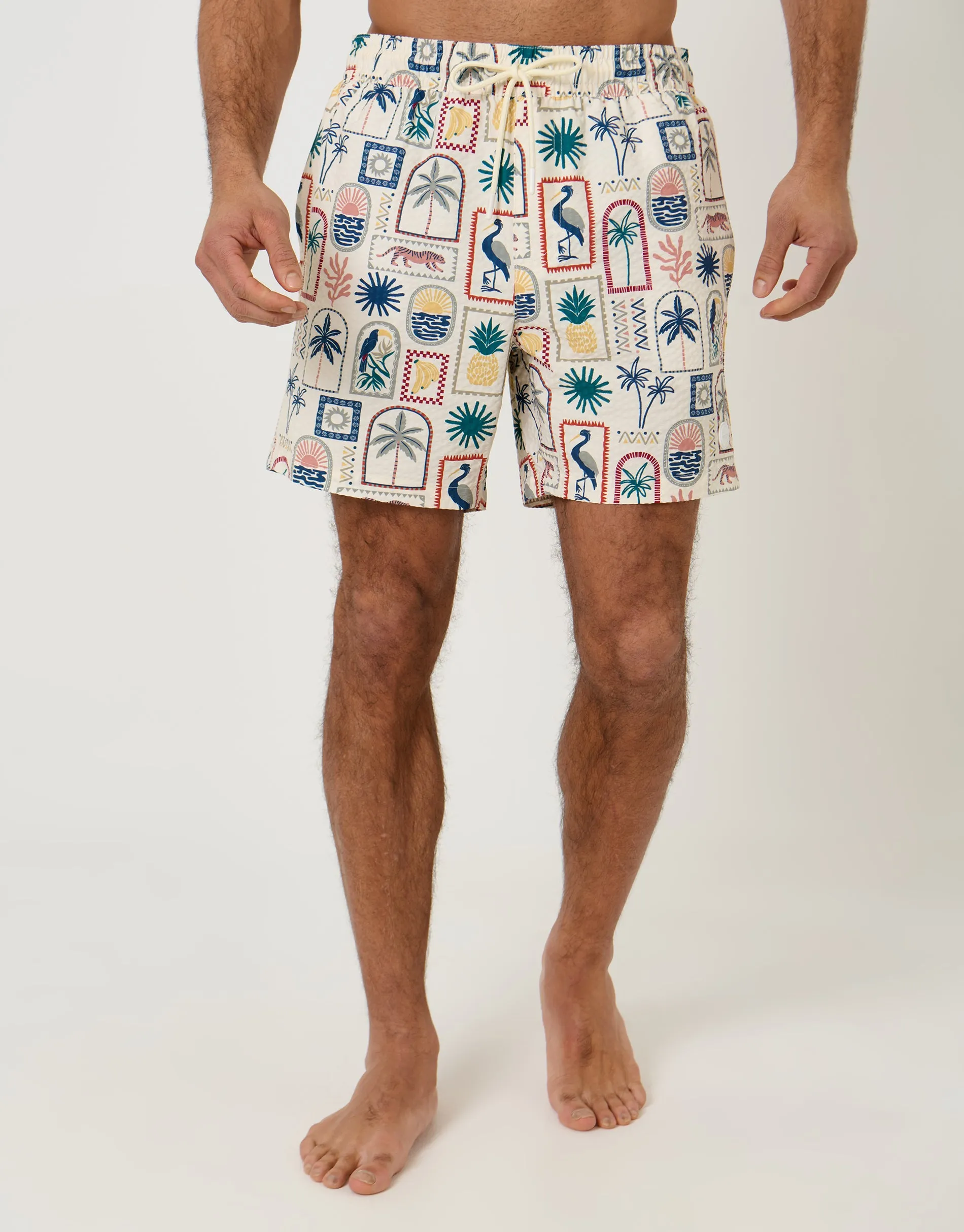 Tropical Stamp Print Seersucker Swim Shorts in Cream sold by Threadbare