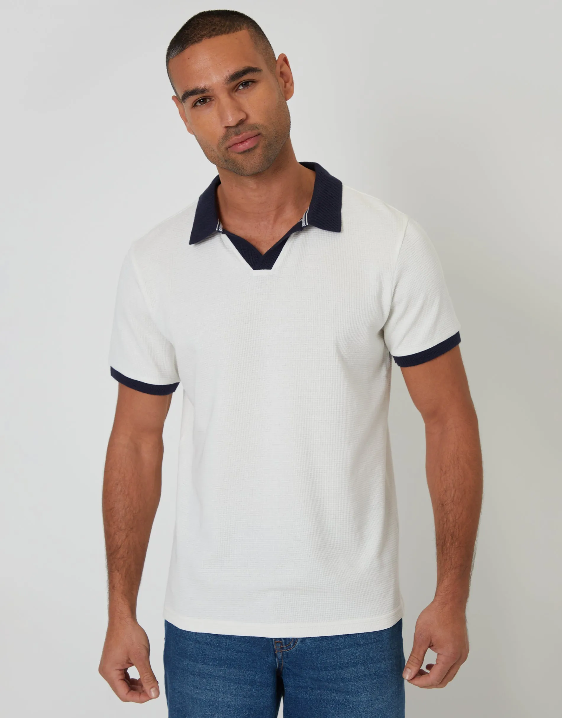 Trophy Neck Waffle Polo Shirt in White sold by Threadbare