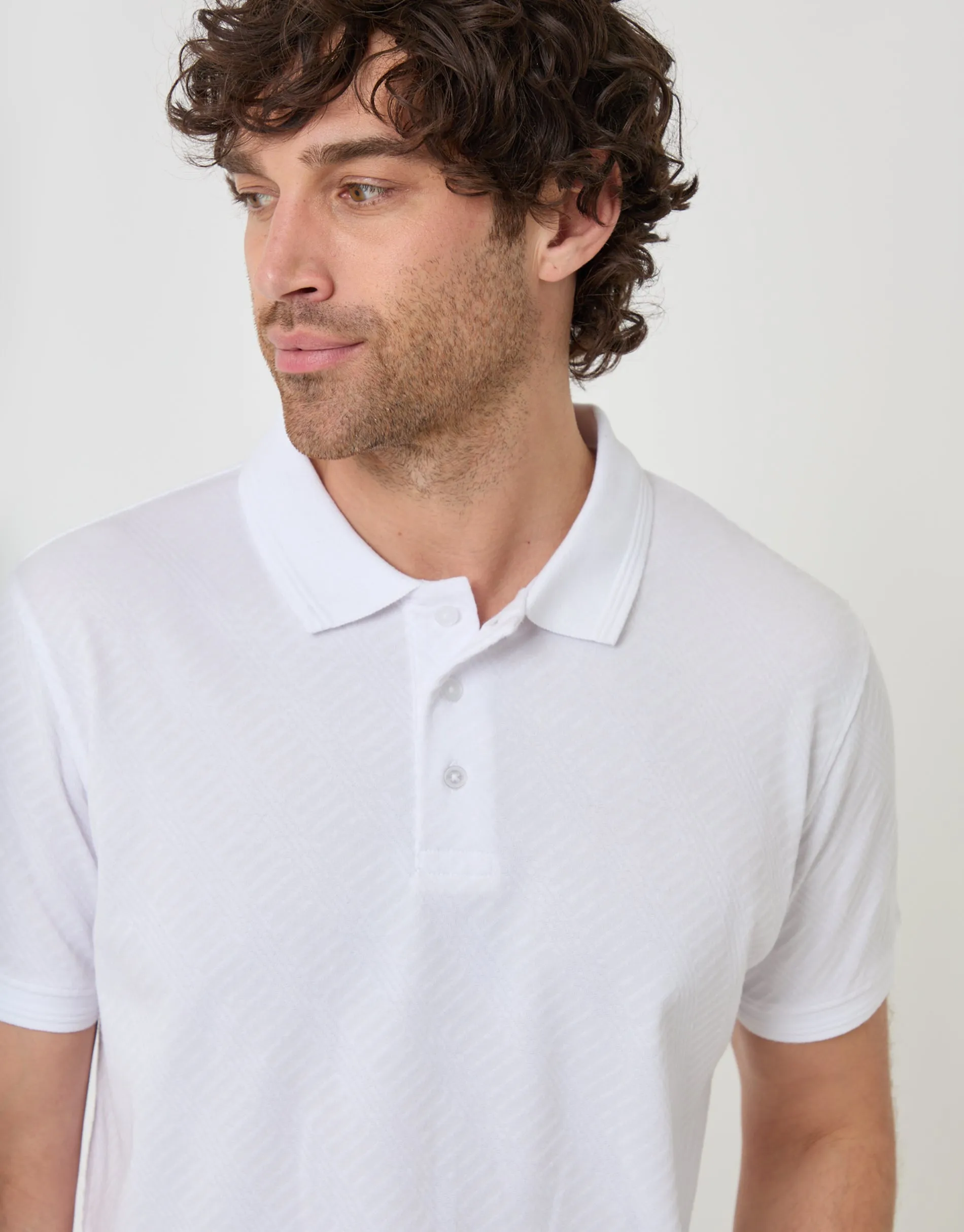 Textured Cotton Polo Shirt in White sold by Threadbare