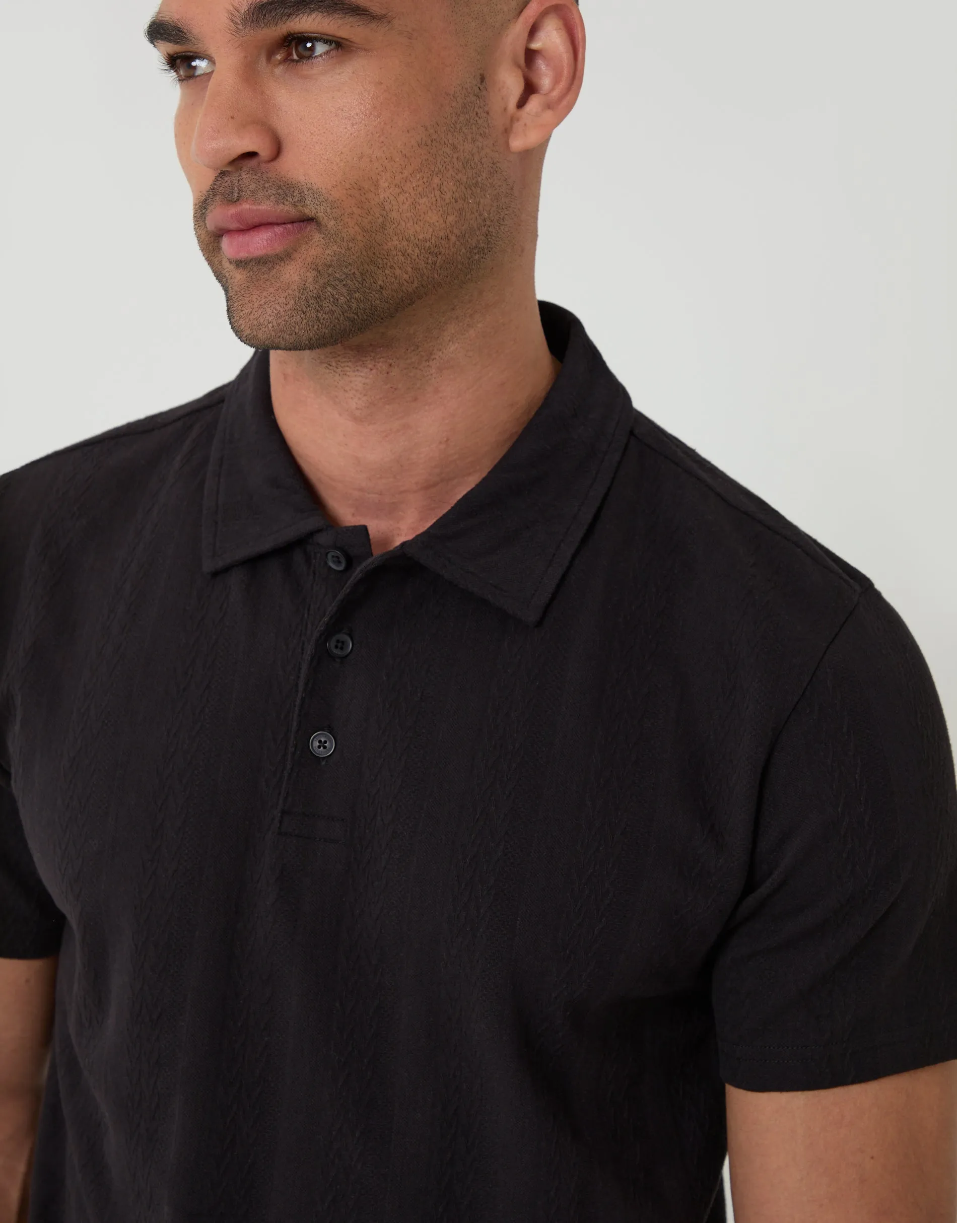 Textured Cotton Polo Shirt in Black sold by Threadbare