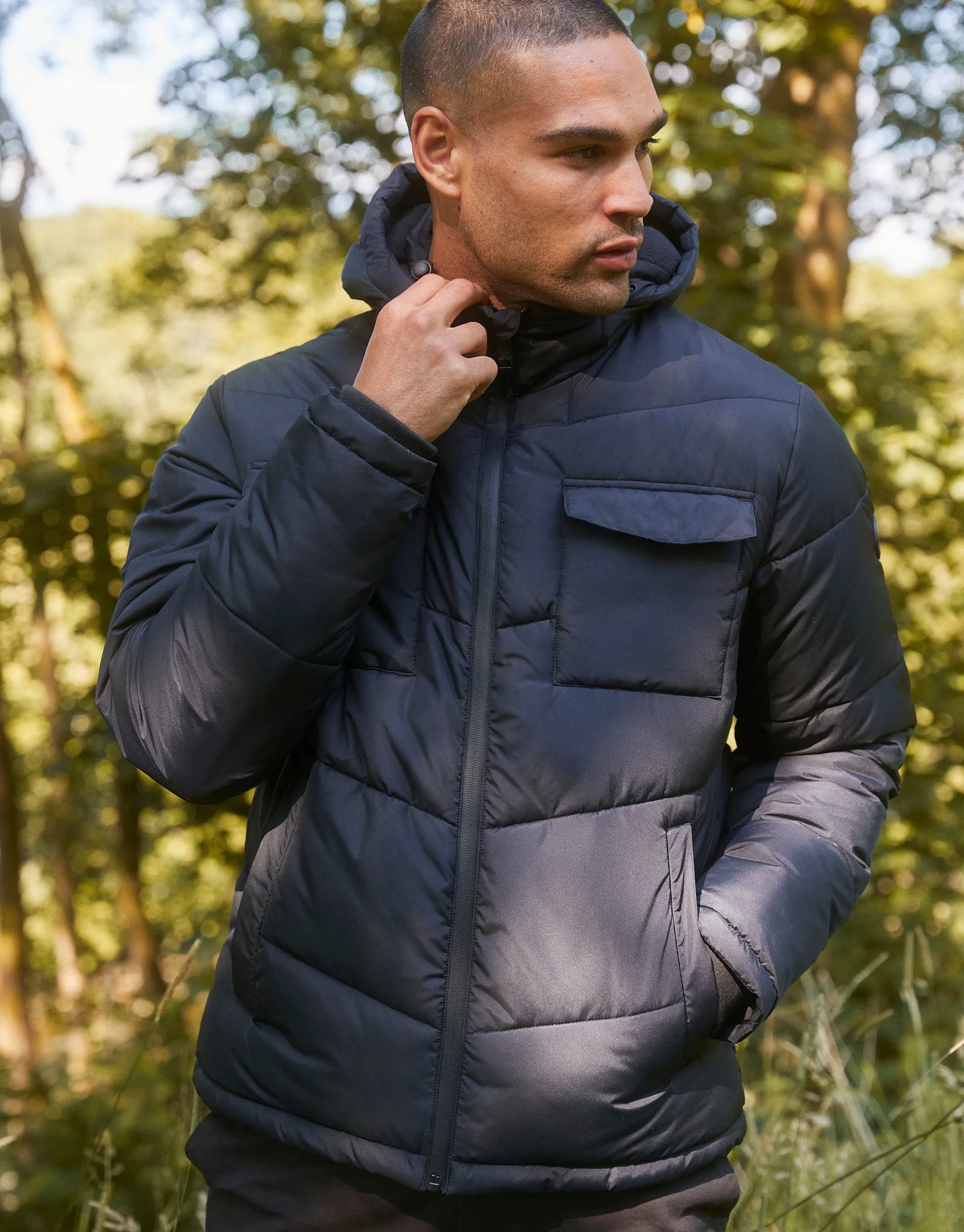 Men's Black Showerproof 4 Pocket Hooded Puffer Jacket sold by Threadbare