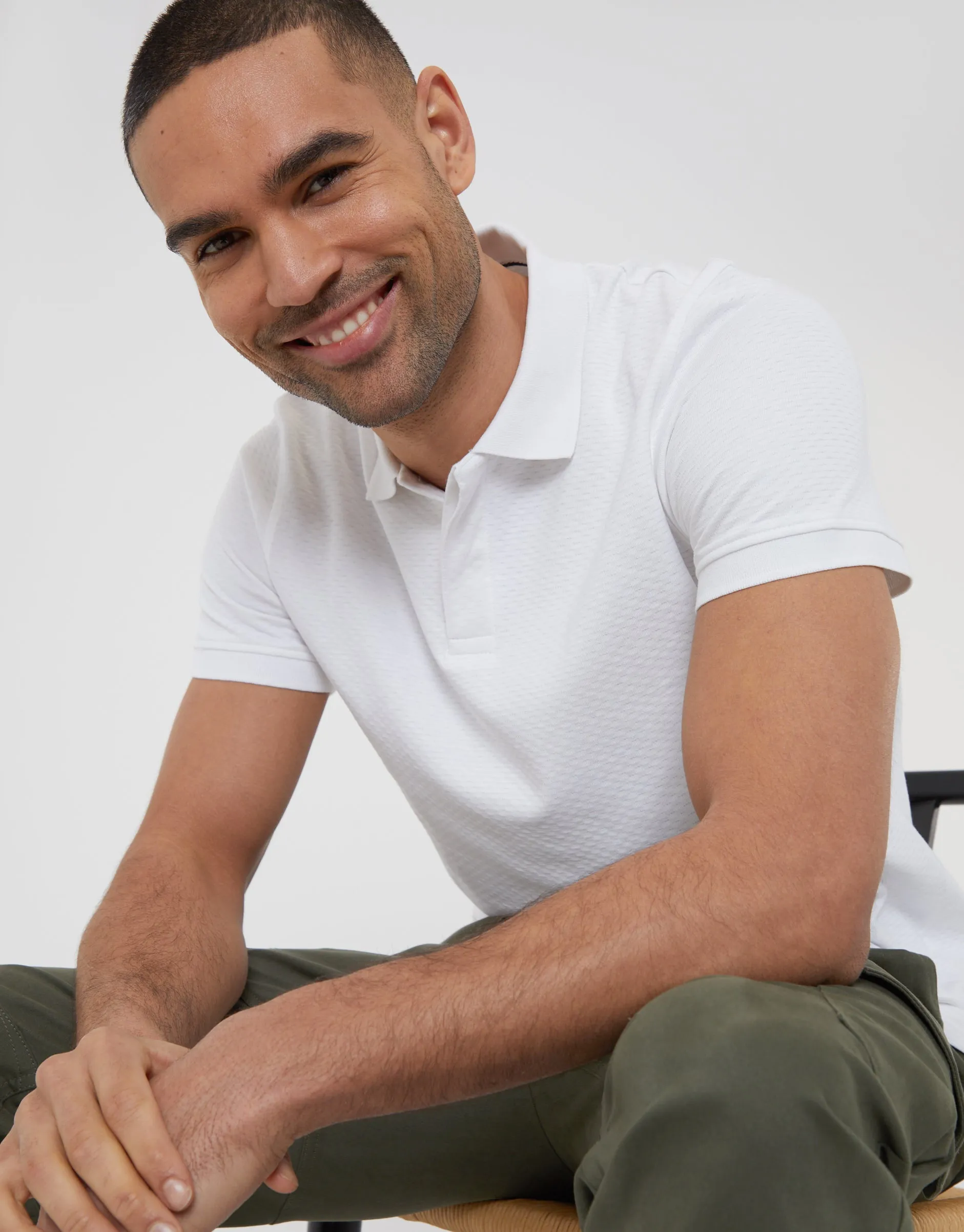 White Textured Hidden Placket Polo Shirt sold by Threadbare