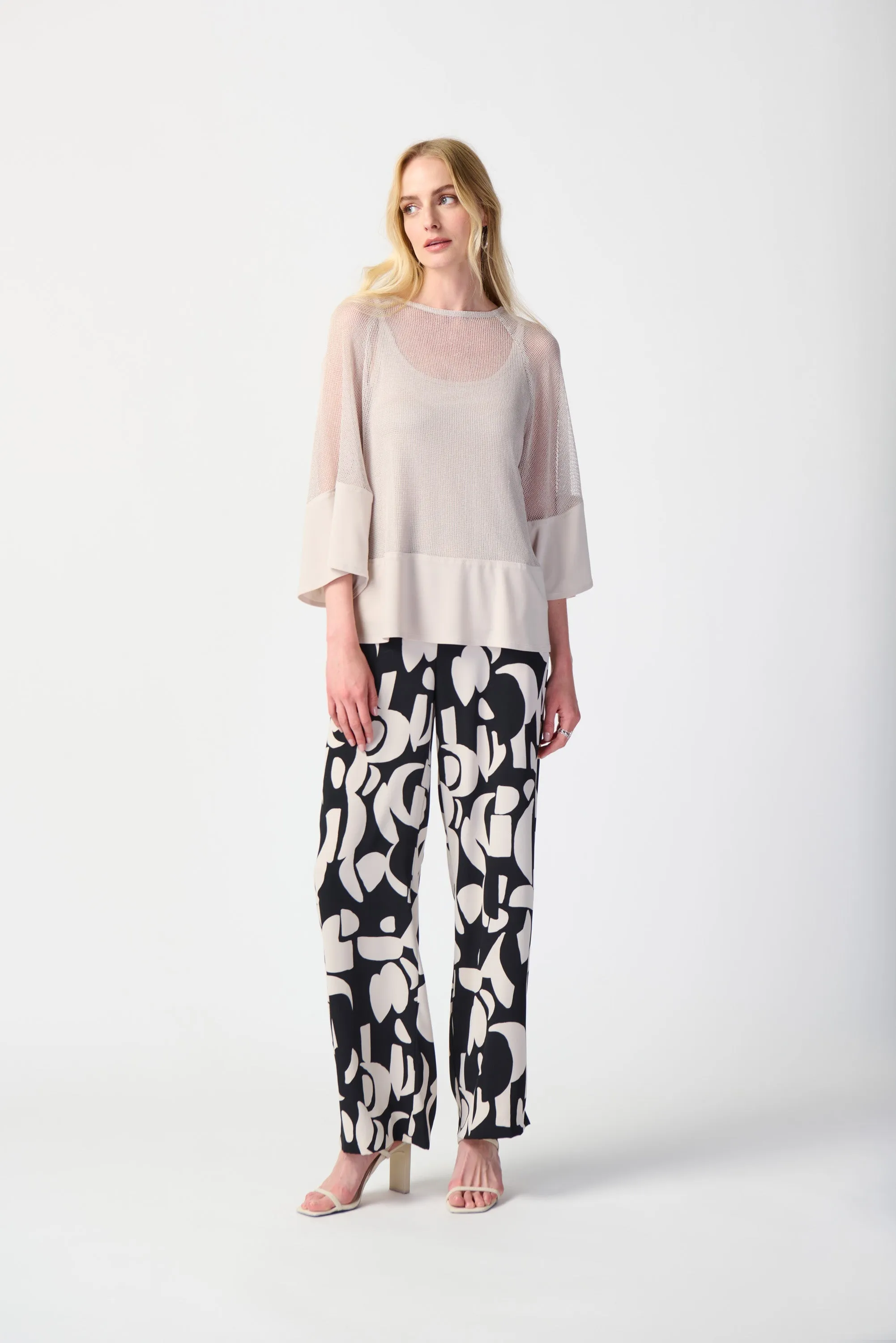 Mesh And Silky Knit Two Piece Top sold by Bellissima