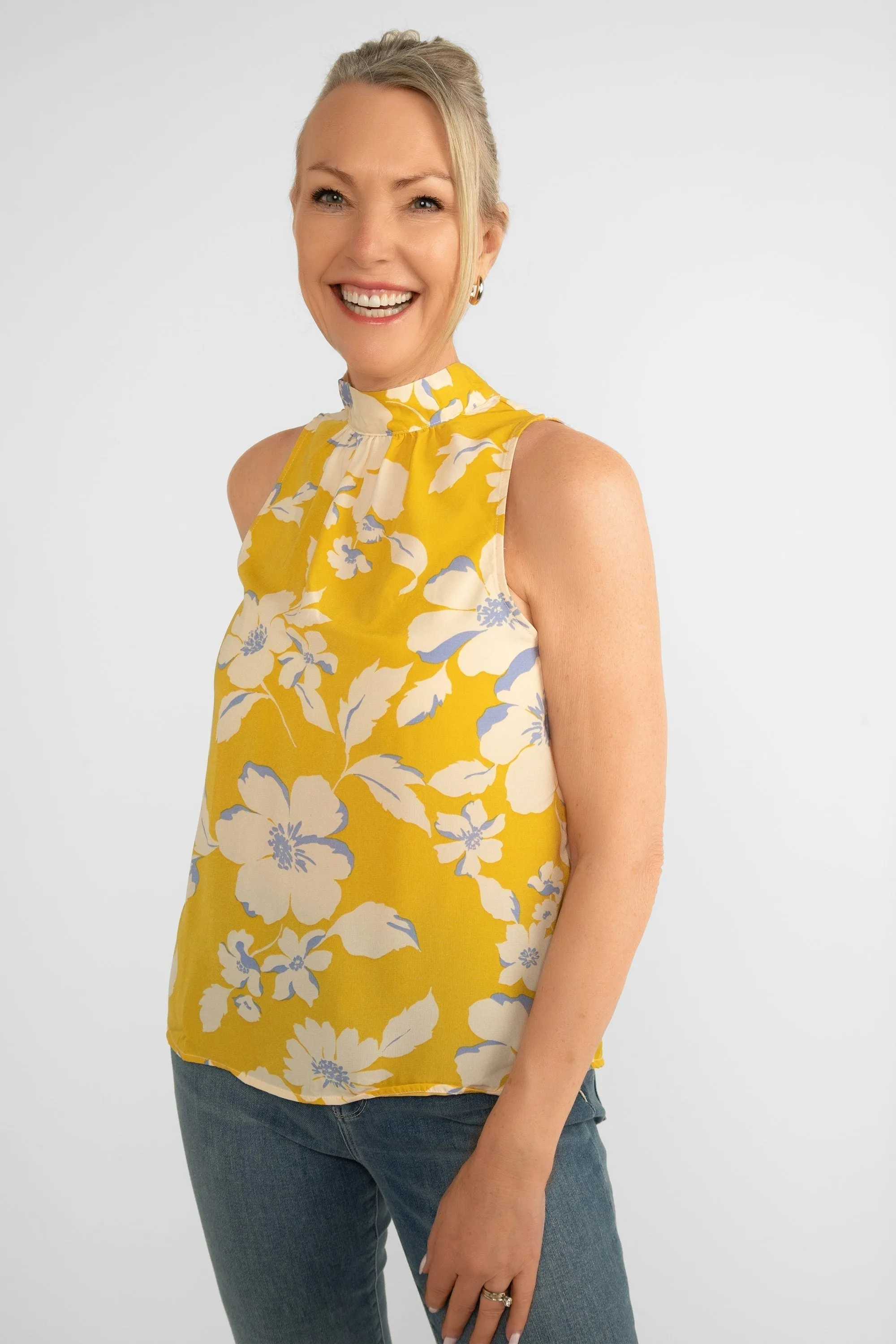 High Neck Floral Print Sleeveless Top sold by Bellissima
