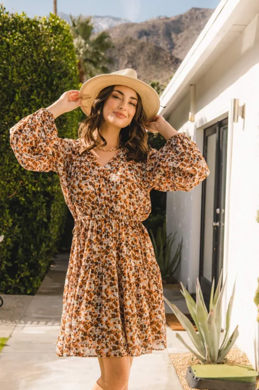 Printed Puff Sleeve Dress sold by Bellissima
