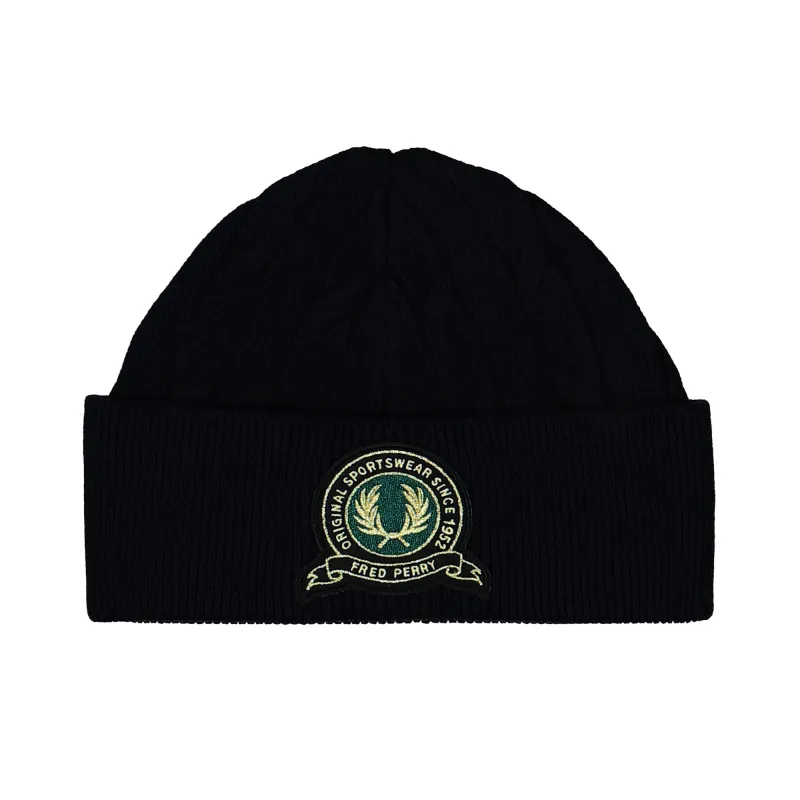 Tennis Badge Cable Beanie made by Fred Perry