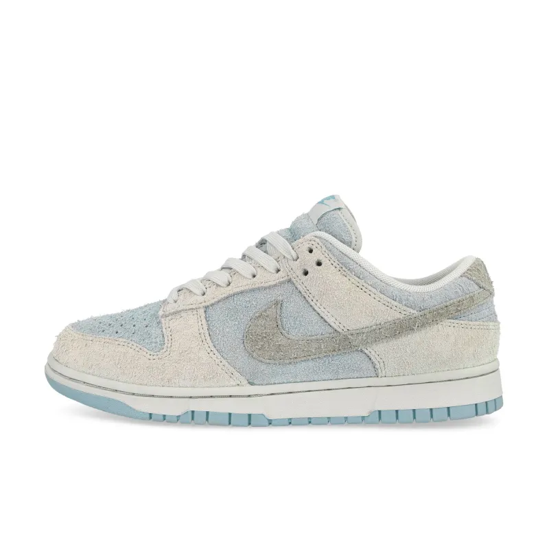 W Dunk Low sold by OVERKILL