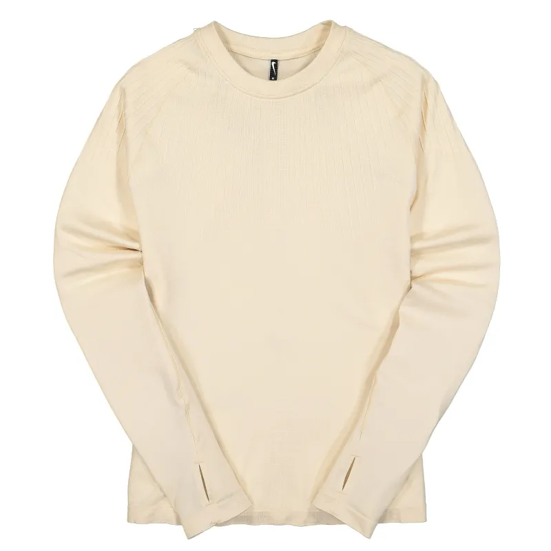 Wmns NRG Dri-Fit Longsleeve Top made by Nike