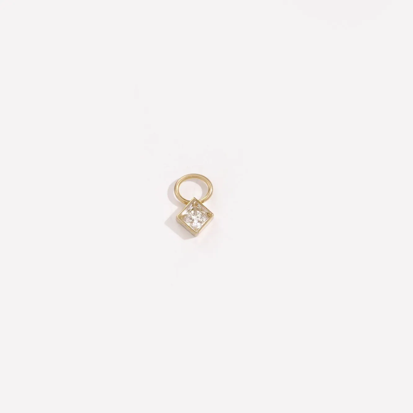 Topaz Huggie Charm sold by Raquel Rosalie