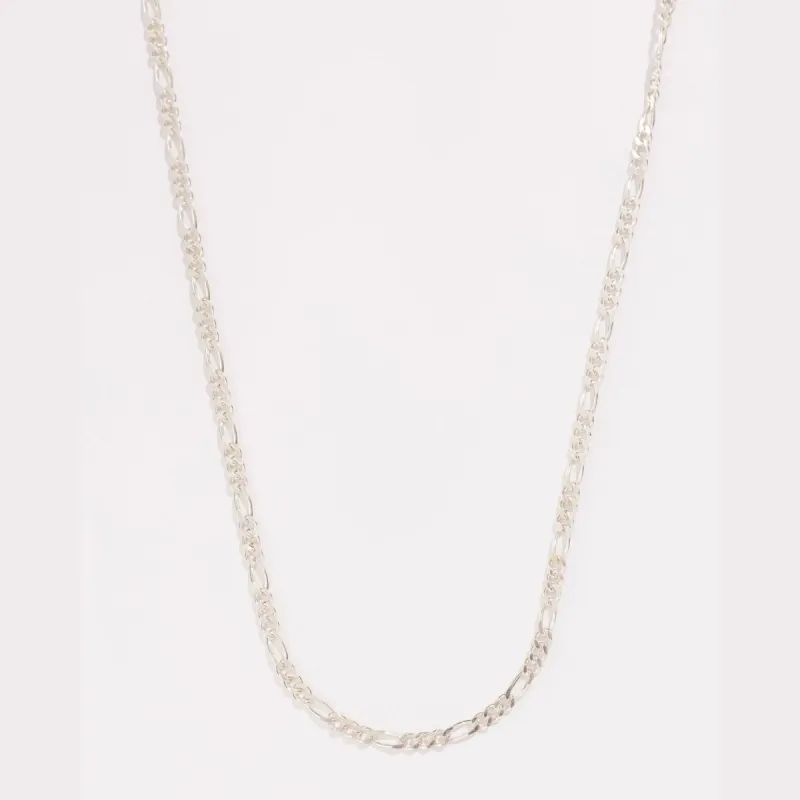 Sterling Silver Figaro Chain sold by Raquel Rosalie
