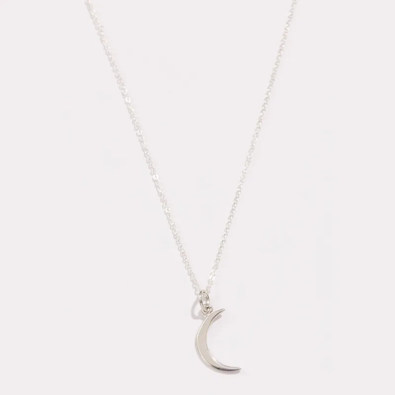Crescent Moon Pendant sold by Raquel Rosalie