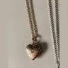 Lover Locket sold by Raquel Rosalie