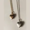 Lover Locket sold by Raquel Rosalie