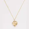 Lover Locket sold by Raquel Rosalie