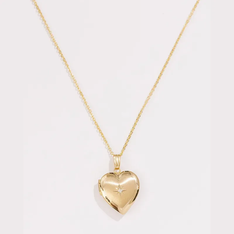 Lover Locket sold by Raquel Rosalie