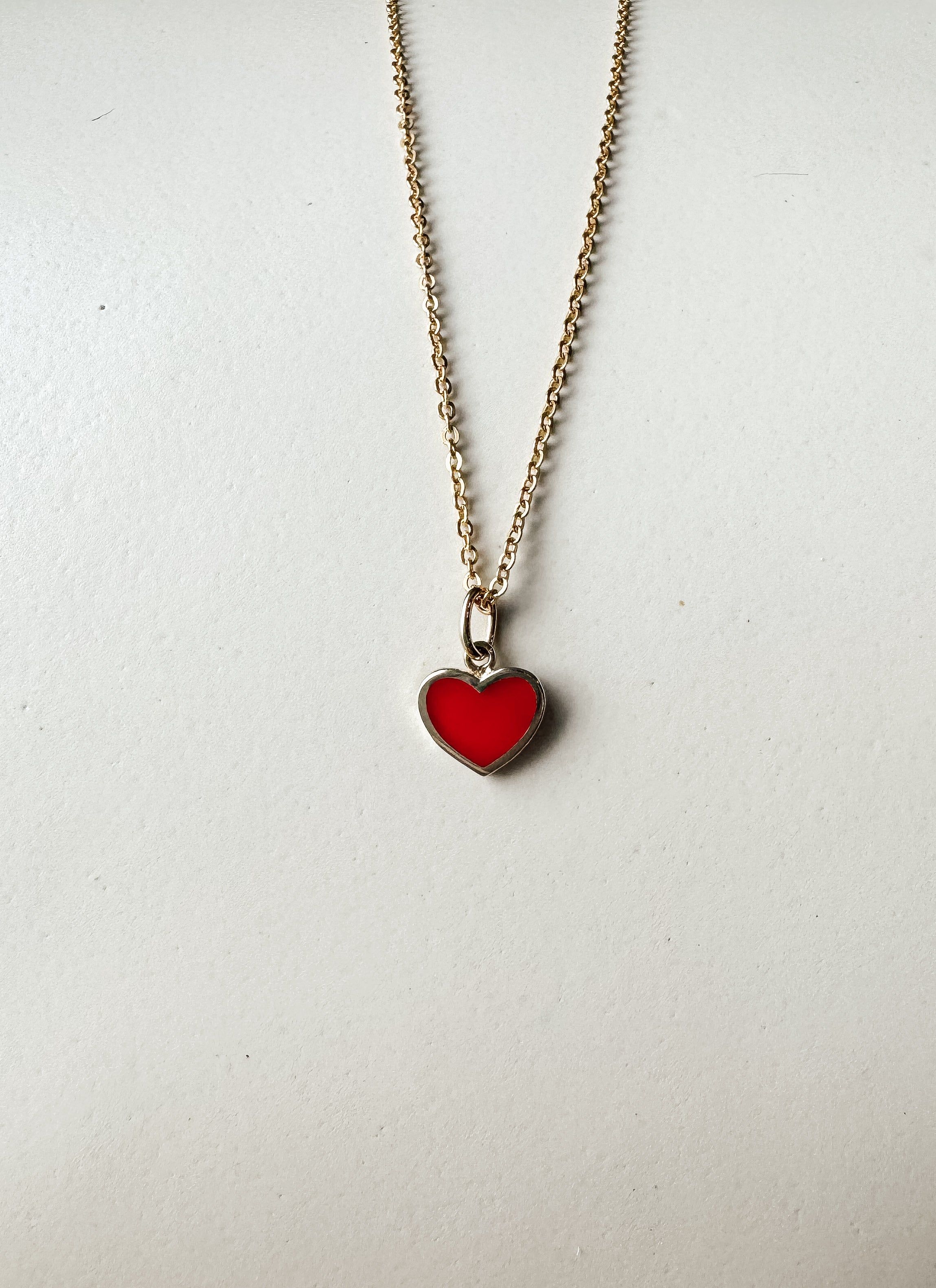 So Many Kisses Pendant sold by Raquel Rosalie