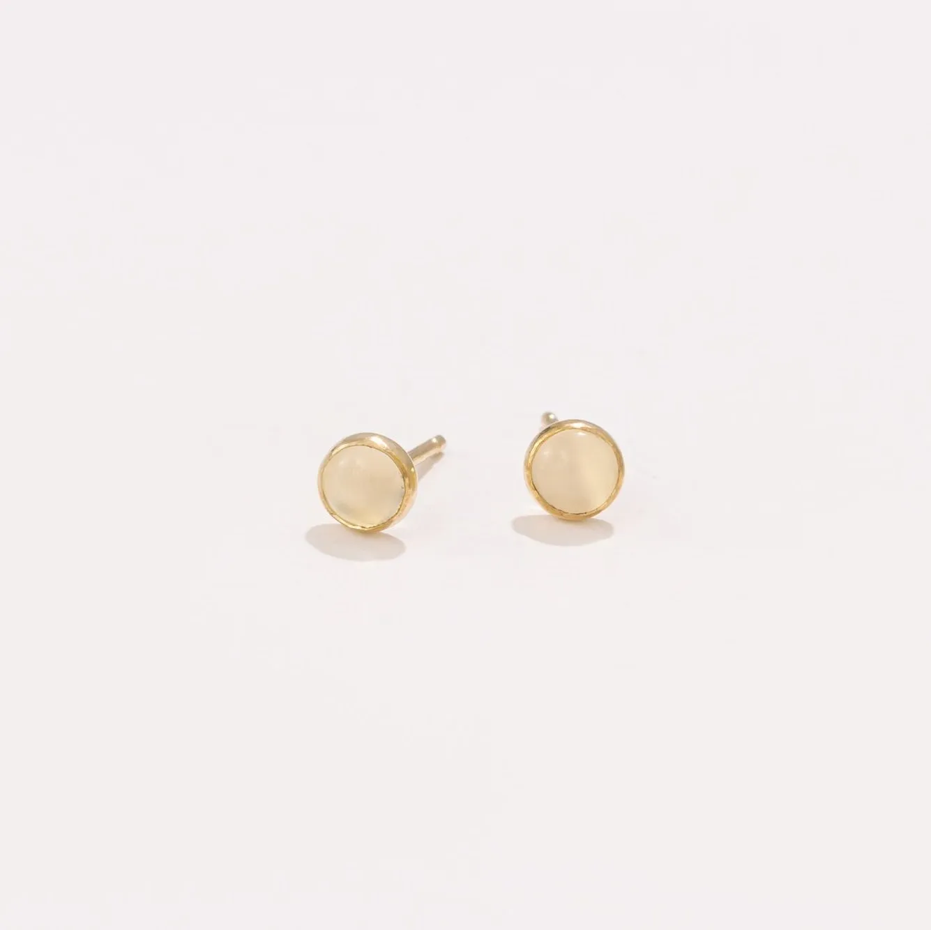 White Moonstone Studs sold by Raquel Rosalie