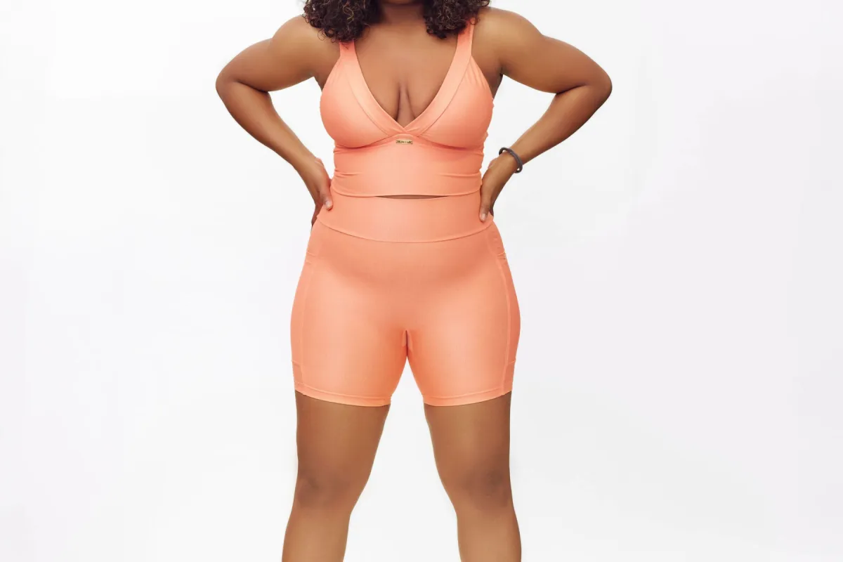 Revive 6” Pocket Leggings- Tangerine sold by FitEet