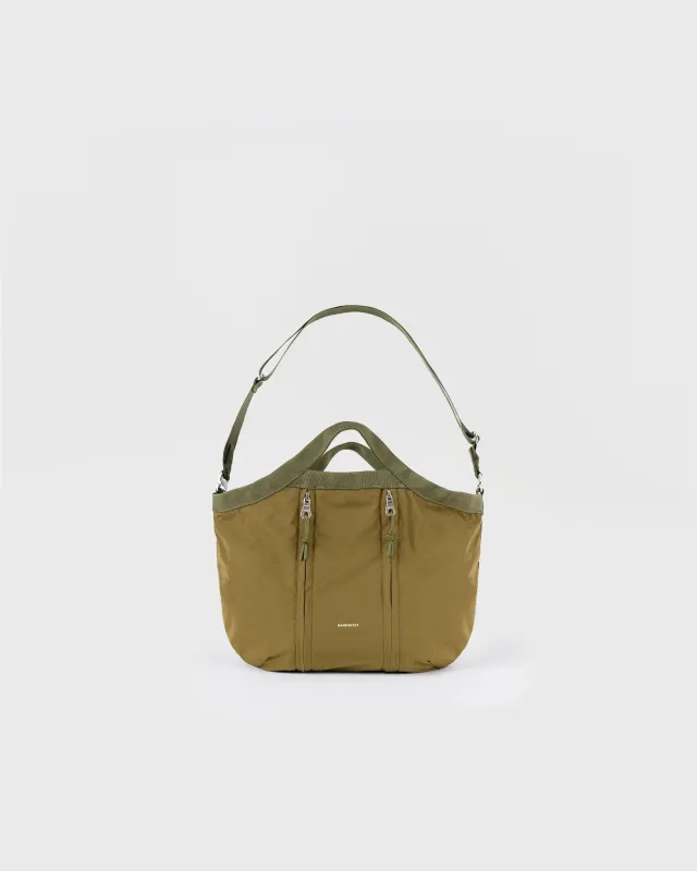 GRID Expandable Crosbody Bag Olive made by SANDQVIST