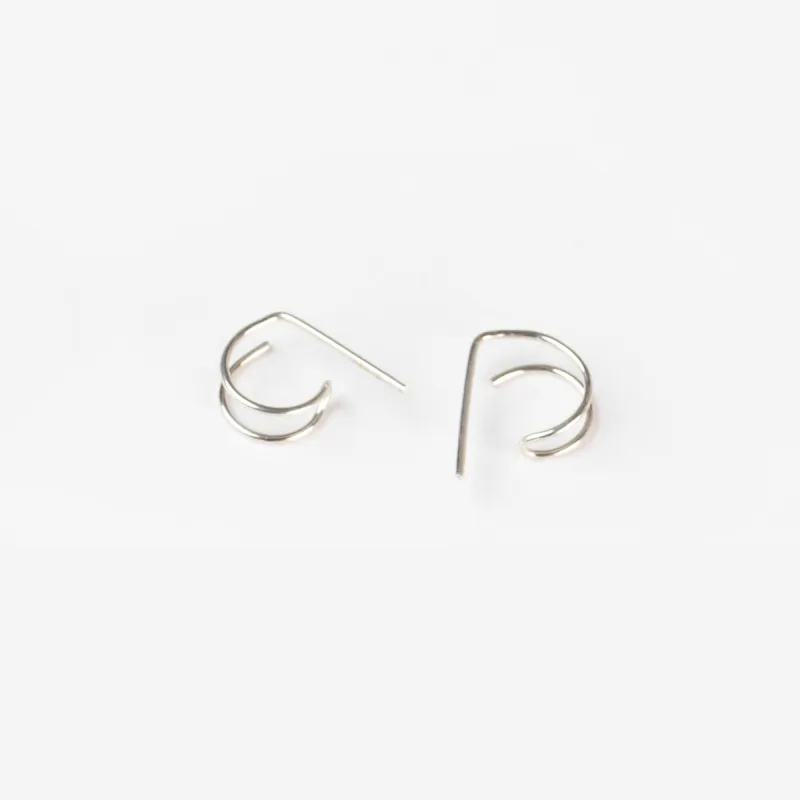 Journey of Hope Huggie Earrings in Silver sold by Forai