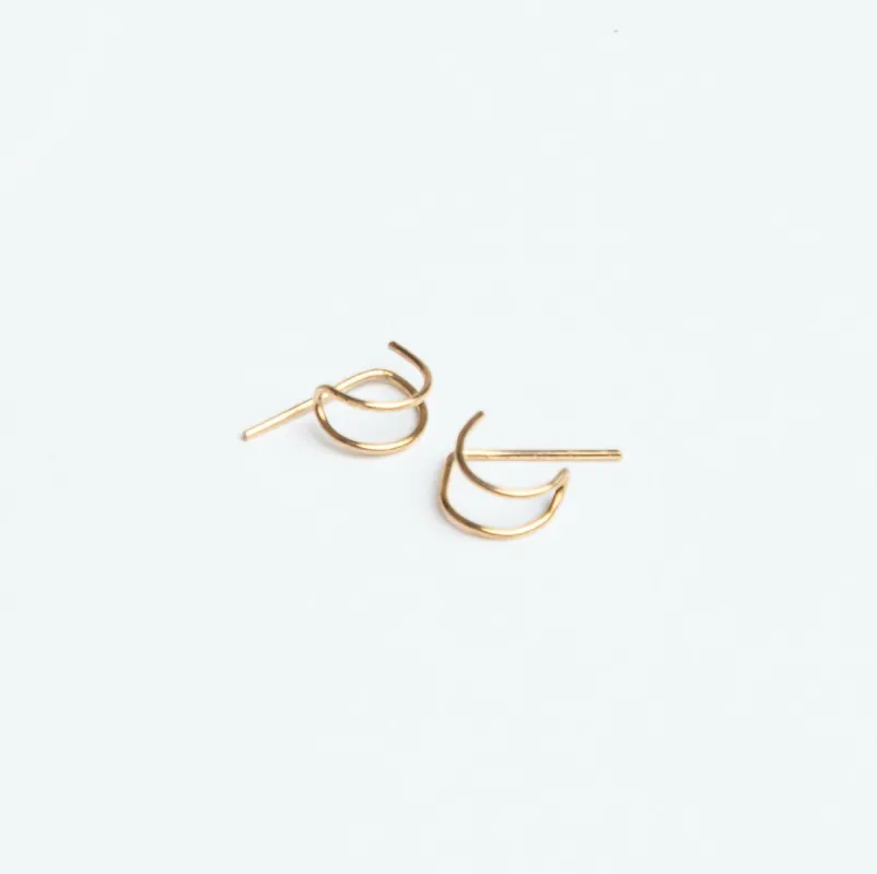 Journey of Hope Huggie Earrings in Gold sold by Forai