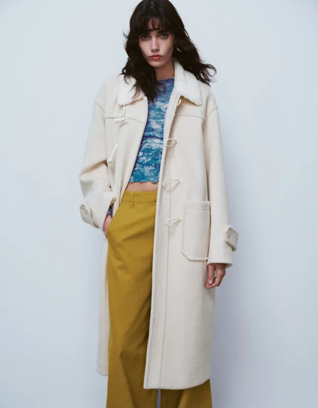 Loose Long Coat With Furry Collar sold by Urban Revivo