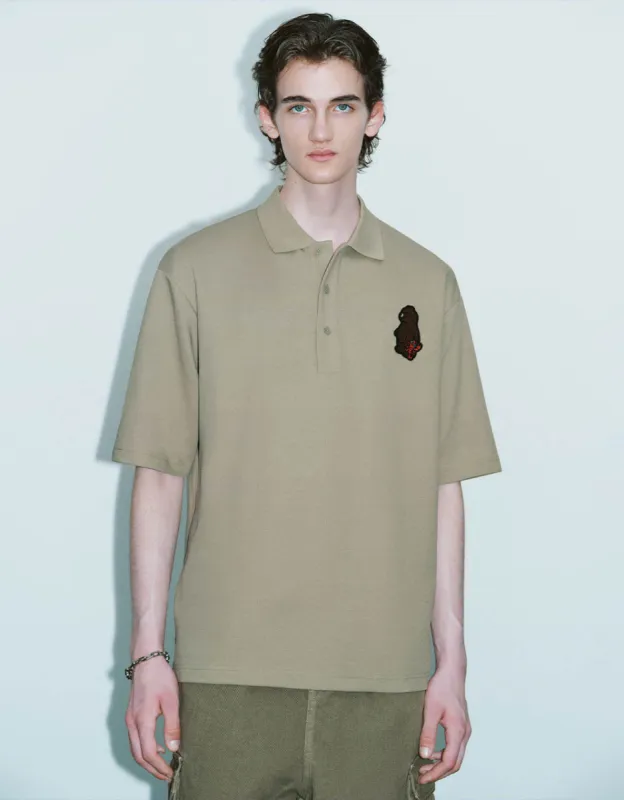 Cartoon Embossed Loose Polo Shirt sold by Urban Revivo