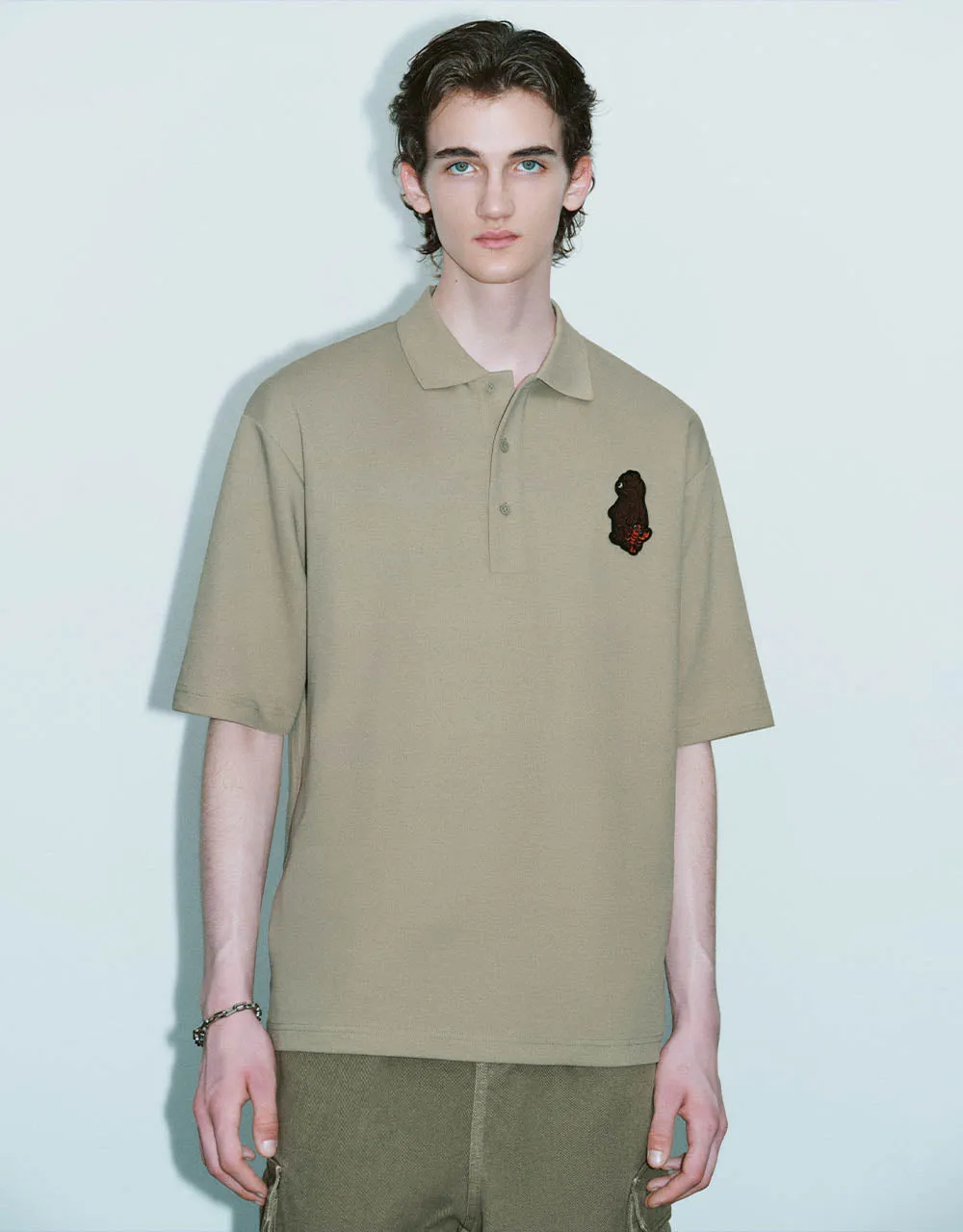 Cartoon Embossed Loose Polo Shirt sold by Urban Revivo