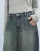 Distressed Carrot Fit Jeans sold by Urban Revivo