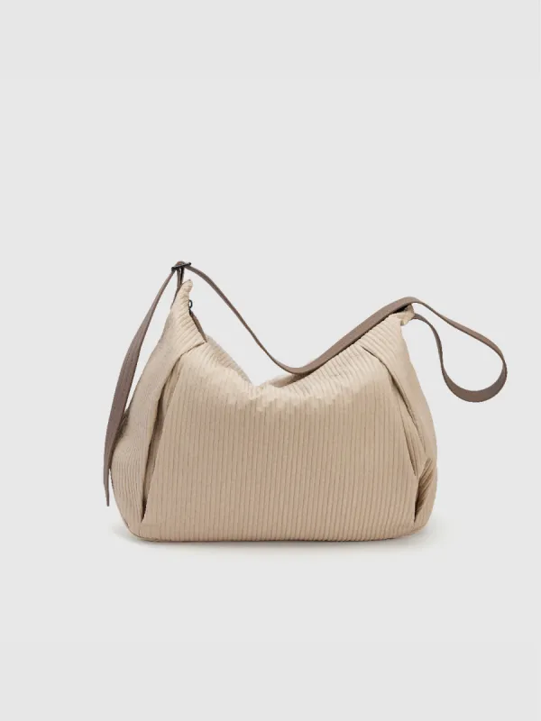 Textured Large Crossbody Bag sold by Urban Revivo