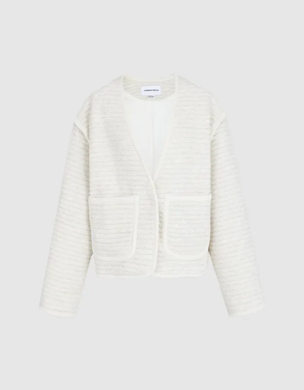 Textured Patched Pocket Winter Coat sold by Urban Revivo