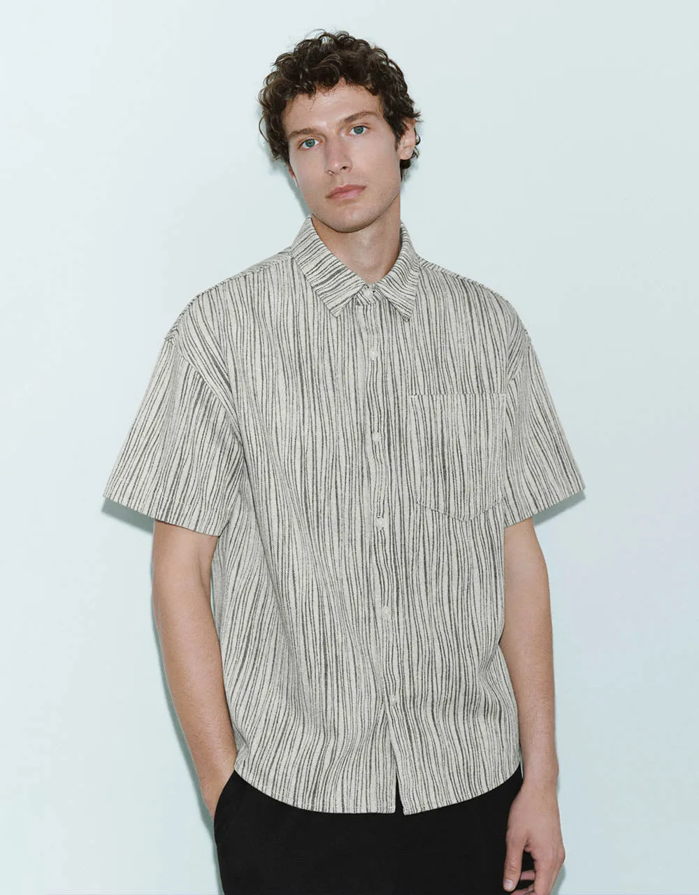 Textured Loose Denim Shirt sold by Urban Revivo