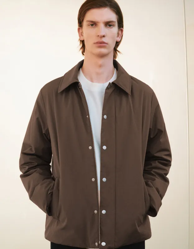 Press Buttoned Padded Coat sold by Urban Revivo