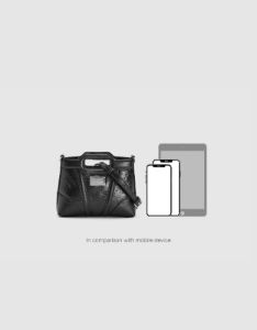 Embossed Vegan Leather Shoulder Bag sold by Urban Revivo